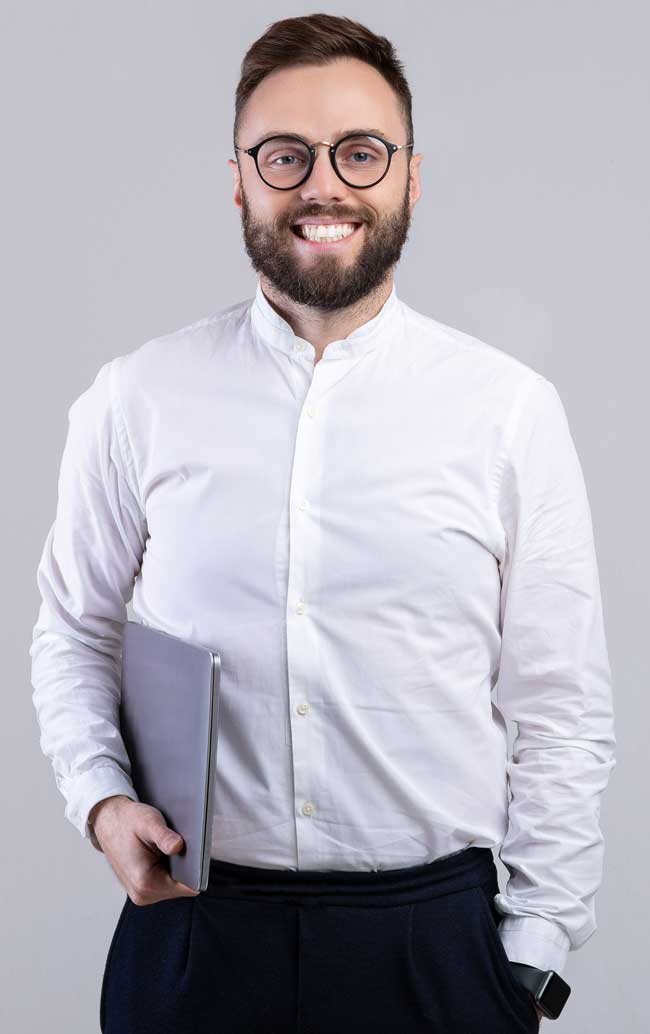 happy-young-businessman-in-formal-clothes